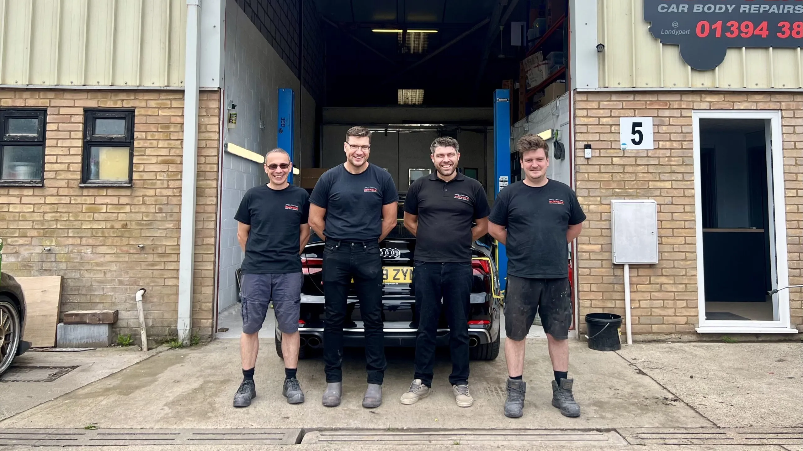 The Suffolk Car Body Repairs team outside the workshop